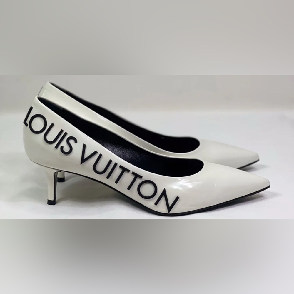 White & Black Louis Vuitton Pointed-Toe
Spellout Pumps